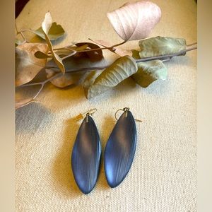 Alexis Bittar blue leaf lucite earrings.